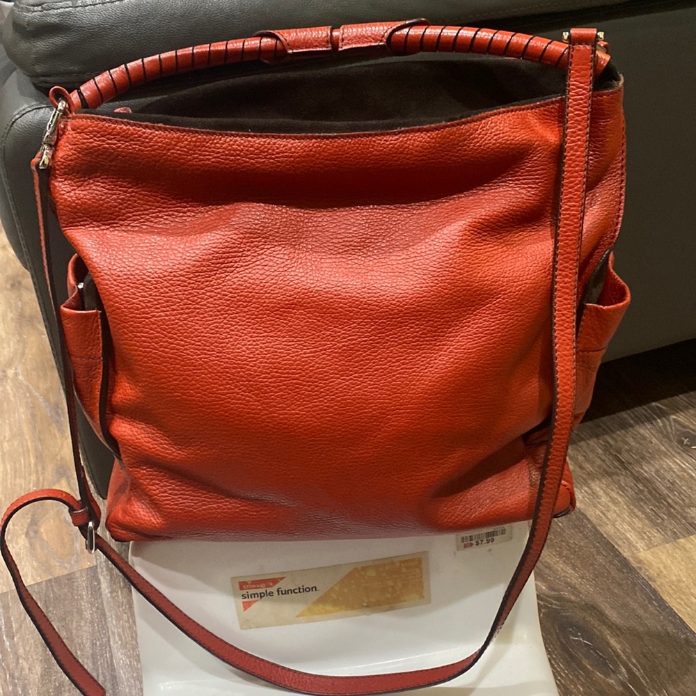 Rust orange Bag all leather and sued, made in Italy wore twice.  Nice
